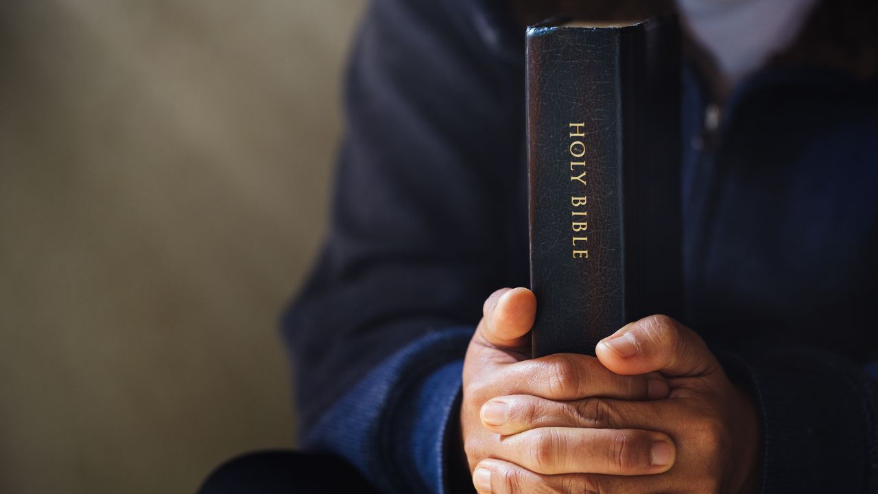 Man holding Bible